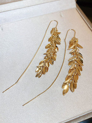 Boucles d'oreilles pendantes en forme de feuilles, à pompons
