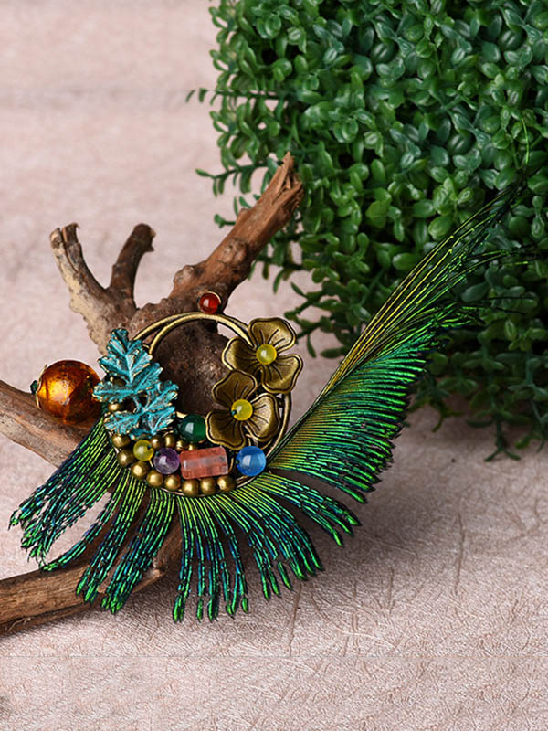 Broche florale de plume de paon vintage