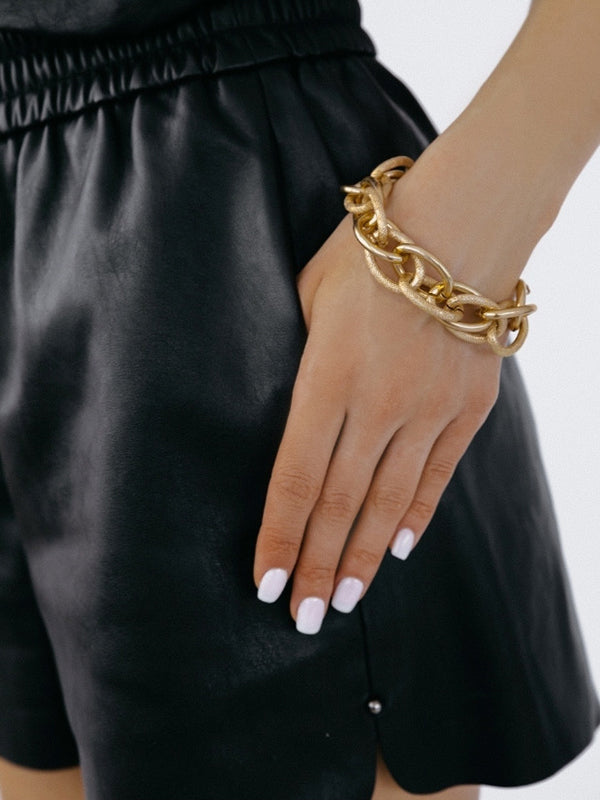 Parure collier et bracelet ajourée couleur unie