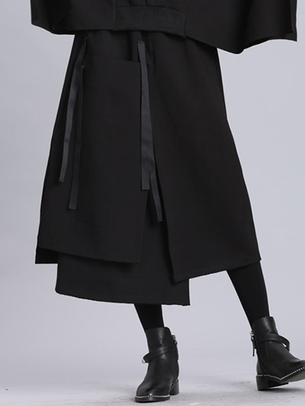 Jupe Empire noire asymétrique à bandes surélevées