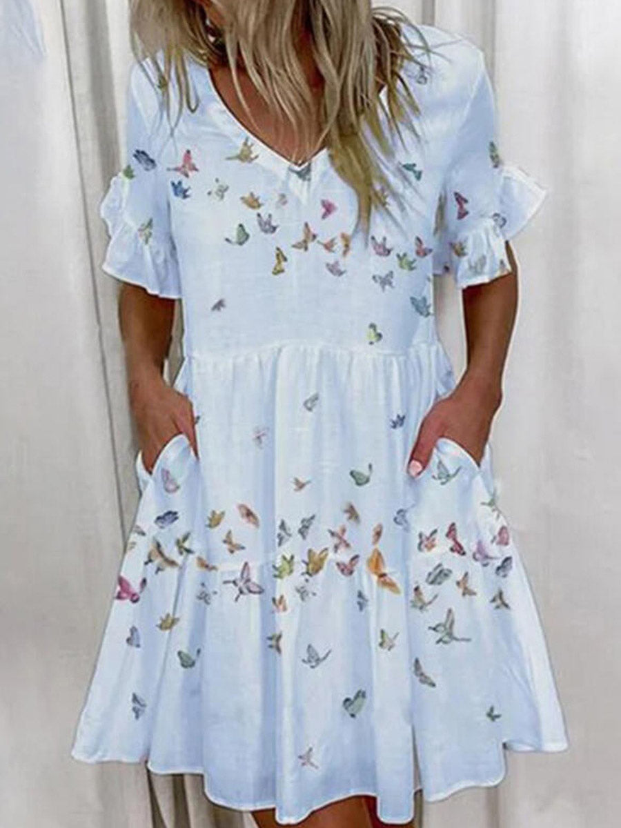 Robe mi-longue plissée imprimée coupe trapèze, taille haute, à poches, à empiècements, à col en V, couleur contrastée
