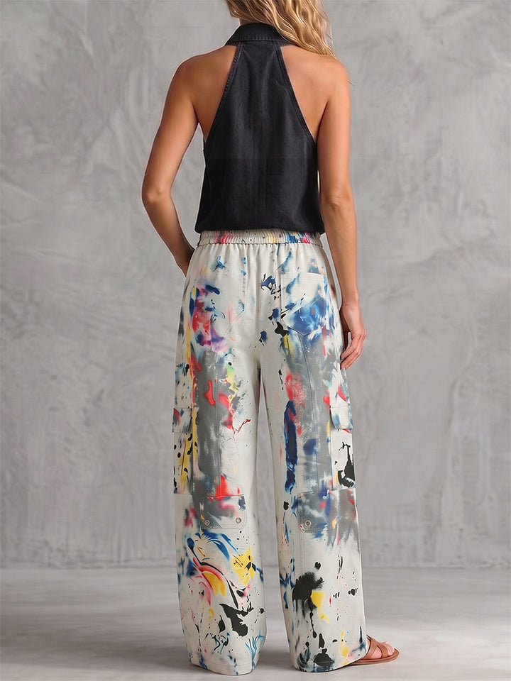 Bas de pantalon en Jean taille haute, jambe large, boutonné, couleur contrastée, poches imprimées graffitis