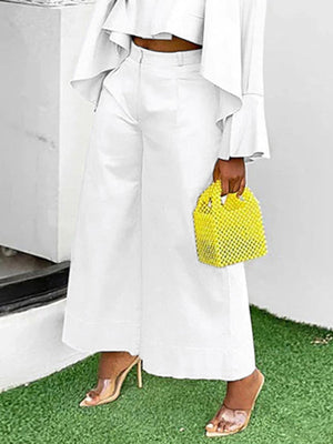 Pantalon à jambes larges, à empiècements, couleur unie