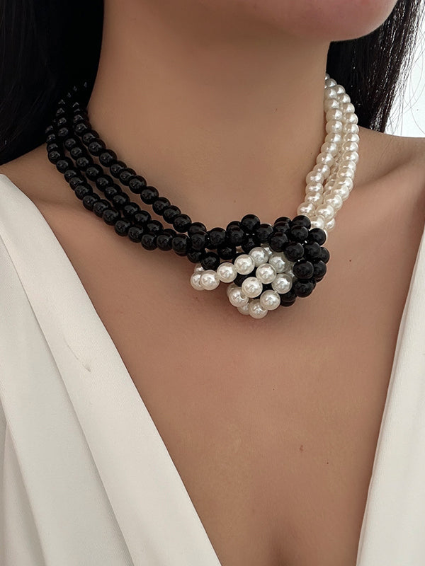 Collier perlé à empiècements