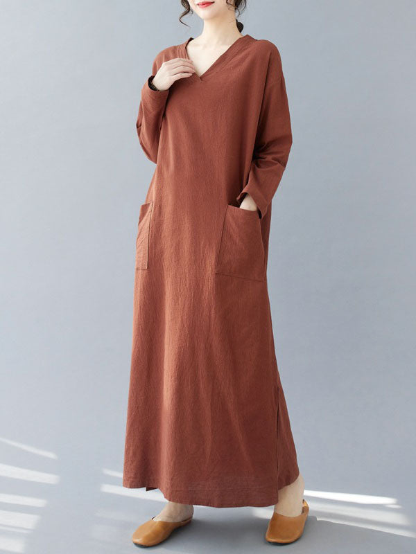 Robe longue fendue sur le côté coupe trapèze, à manches longues, à poches, à col en V, couleur unie