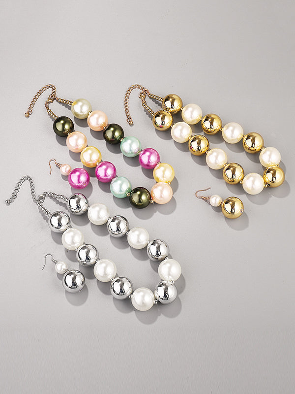 Parure boucles d'oreilles pendantes et collier géométrique couleur contrastée
