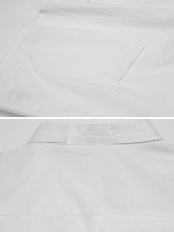 Blouse unie à coupe irrégulière et col revers