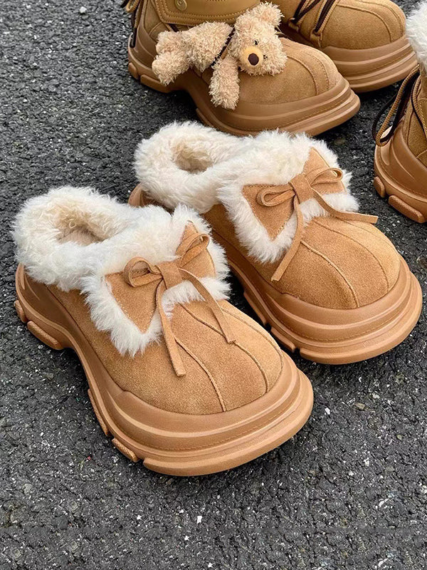 Mules à plateforme à bout rond et nœud