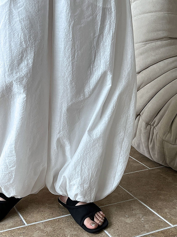 Pantalon taille haute, à taille élastique, à empiècements, couleur unie