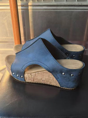 Mules ajourées à bout ouvert