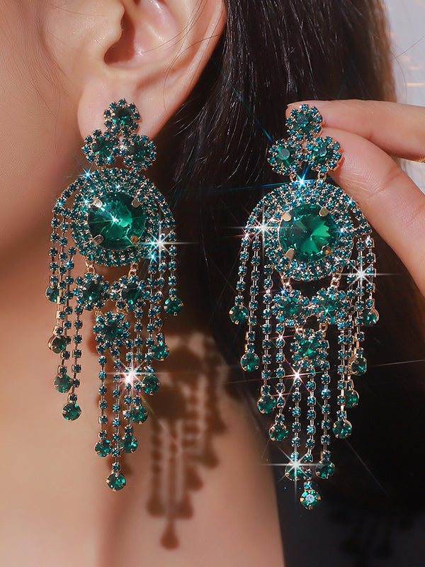 Boucles d'oreilles pendantes géométriques à pompons
