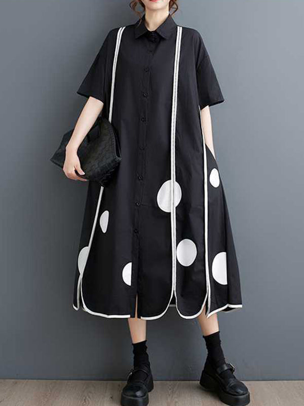 Robe chemise boutonnée fendue devant coupe trapèze, à manches mi-longues, à poches, à pois, à empiècements, à col revers