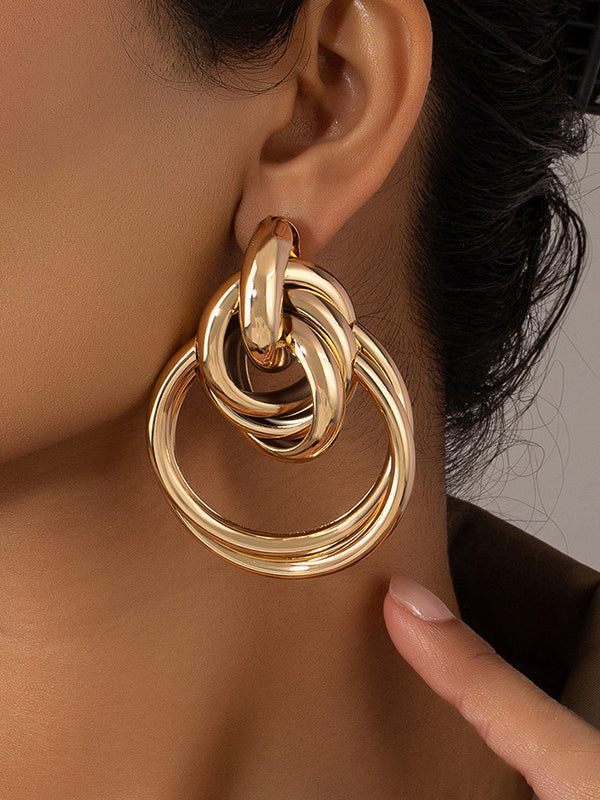Boucles d'oreilles géométriques ajourées brillantes