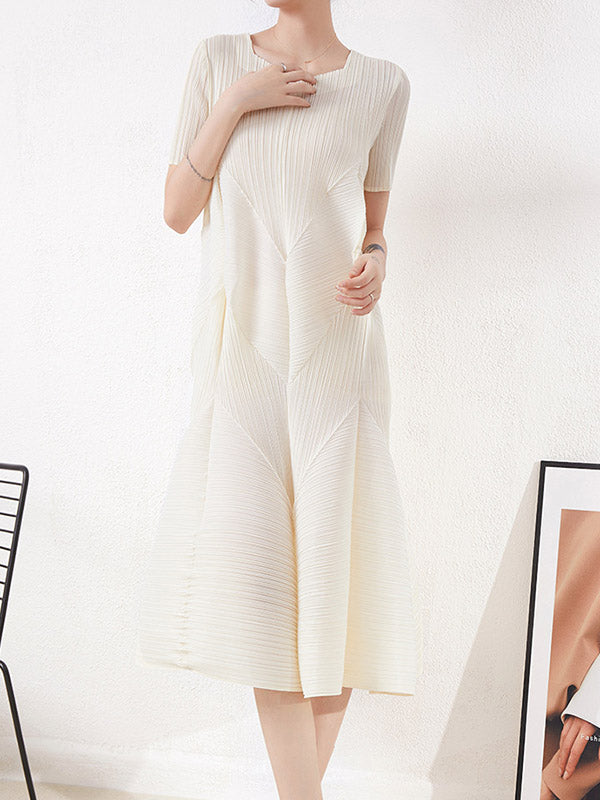 Robe mi-longue ample plissée taille haute, à col rond, couleur unie