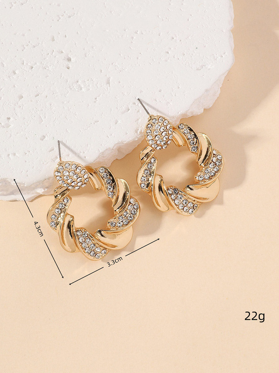 Boucles d'oreilles géométriques à strass