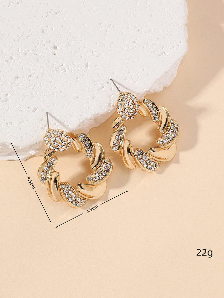 Boucles d'oreilles géométriques à strass