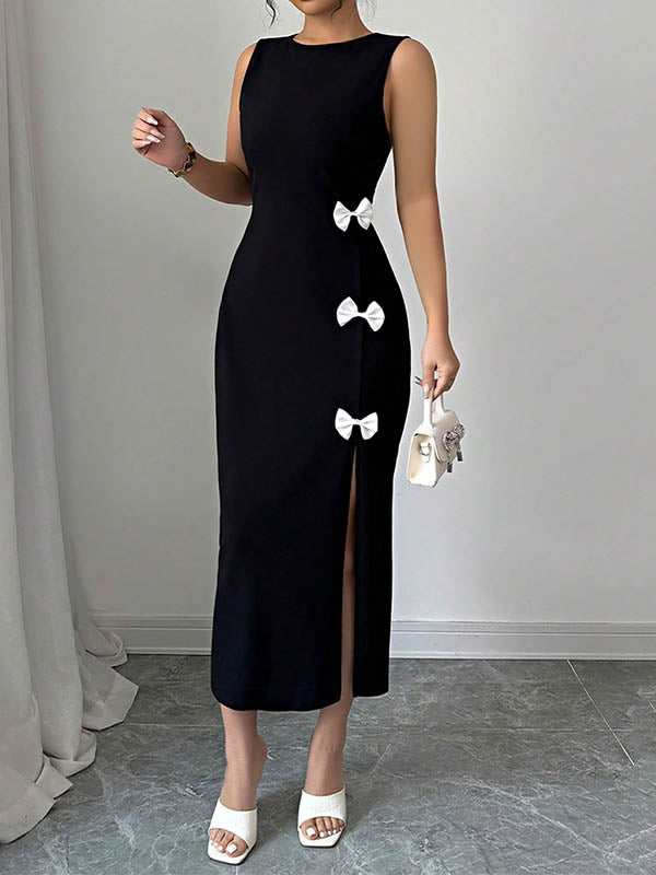 Robe mi-longue moulante fendue sur le côté taille haute, à nœud, à col rond