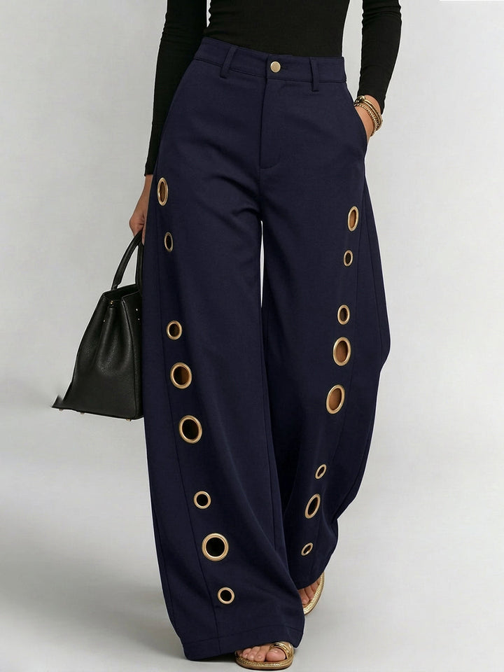Pantalon boutonné ajouré taille haute, à jambes larges, à poches, à empiècements, couleur unie