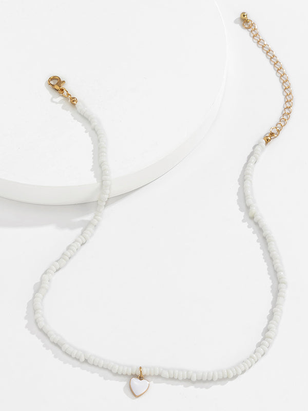 Collier à perles, couleur unie