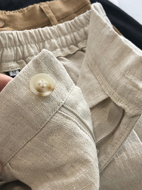 Short ample plissé à jambes larges, à taille élastique, couleur unie