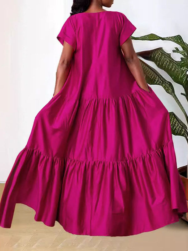 Robe longue ample plissée coupe trapèze, à empiècements, à col en V, couleur unie