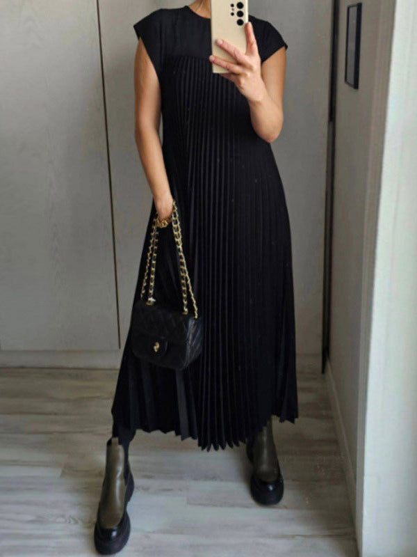 Robe longue plissée coupe trapèze, taille haute, à poches, à empiècements, à col rond, couleur unie