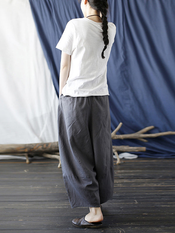 Pantalon large à taille élastique de couleur unie simple