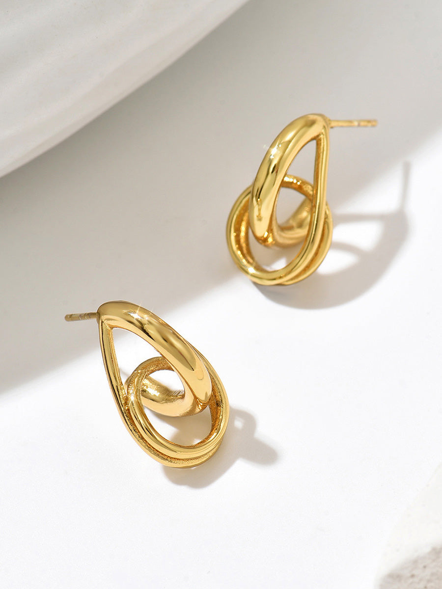 Boucles d'oreilles pendantes géométriques ajourées en forme de goutte