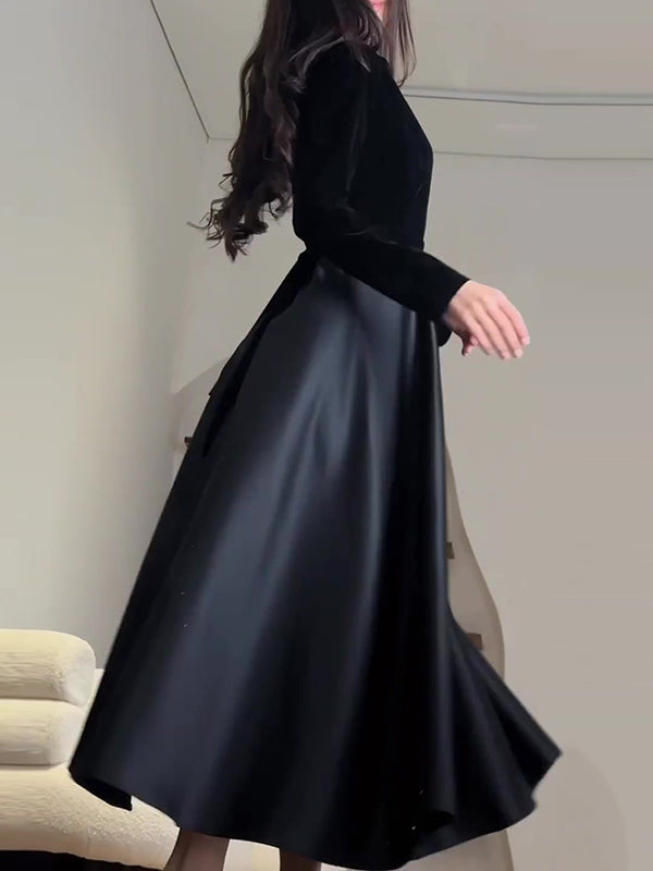 Robe longue plissée coupe trapèze, à manches longues, à empiècements, à fermeture éclair, à col cheminée