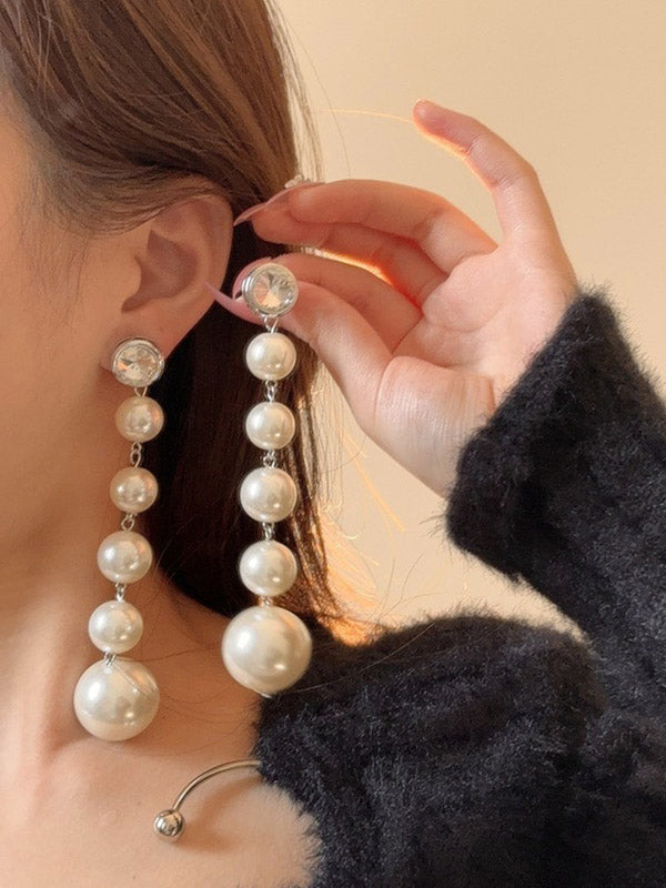 Boucles d'oreilles perlées géométriques brillantes