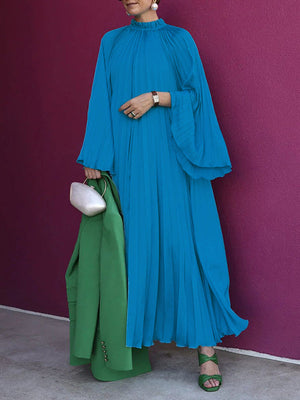 Robe longue ample plissée volantée à manches évasées, à empiècements, à col haut, couleur unie