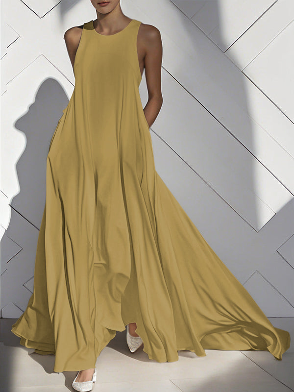 Robe longue ample sans manches, à poches, à empiècements, à col rond, couleur unie