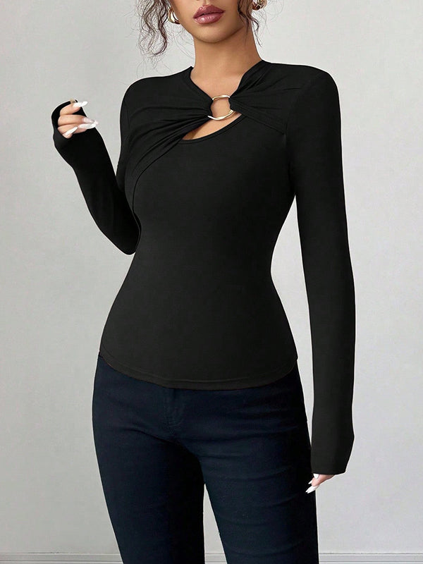 T-shirt à manches longues, coupe près du corps, à empiècements, à col asymétrique, couleur unie