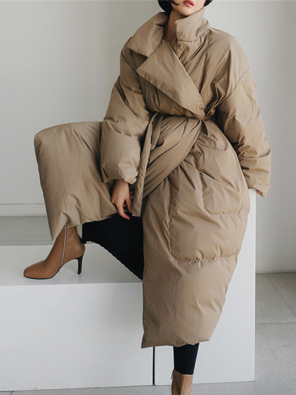 Manteau ample noué matelassé à manches longues, à col haut, couleur unie