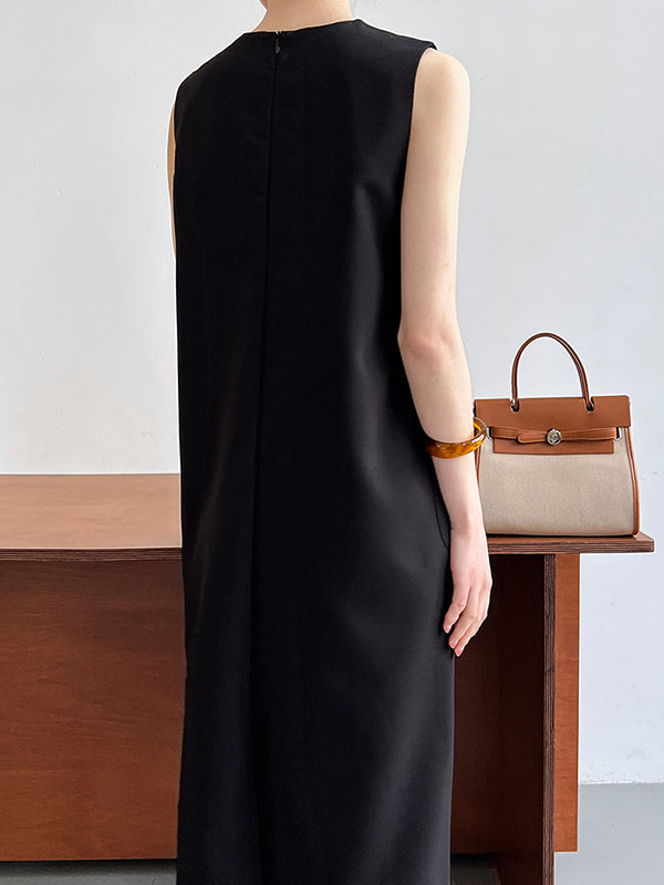 Robe mi-longue ample sans manches, à col rond, couleur unie