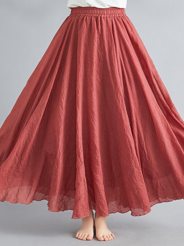 Jupe ample plissée coupe trapèze, à taille élastique, couleur unie