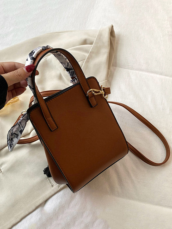 Sac à main imprimé à motifs figuratifs, à empiècements