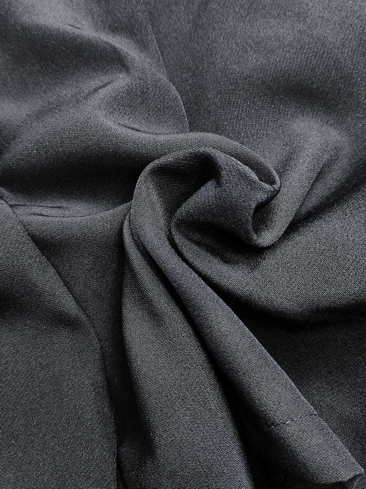 Pantalon de tailleur ample taille haute, avec ceinture, couleur unie
