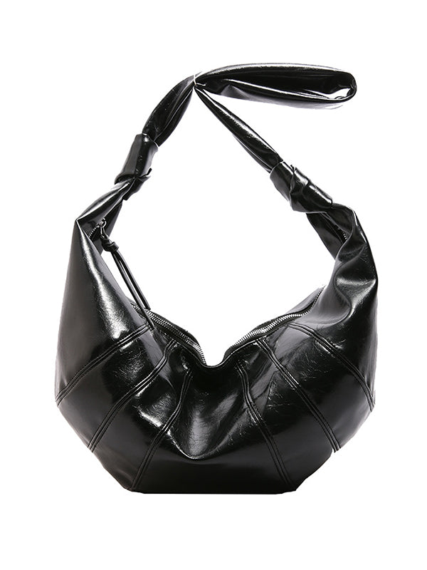 Sac bandoulière géométrique à empiècements, à fermeture éclair