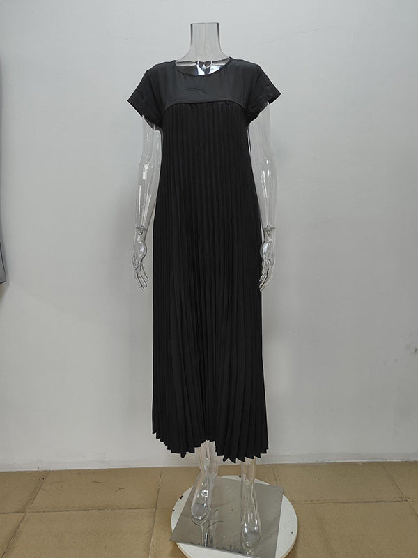 Robe longue plissée coupe trapèze, taille haute, à poches, à empiècements, à col rond, couleur unie