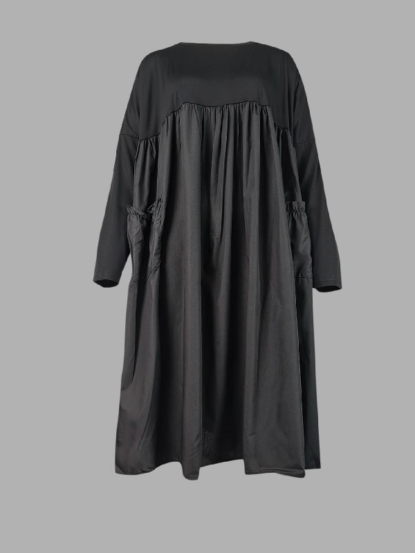 Robe mi-longue simple ample noire à empiècements, à manches longues