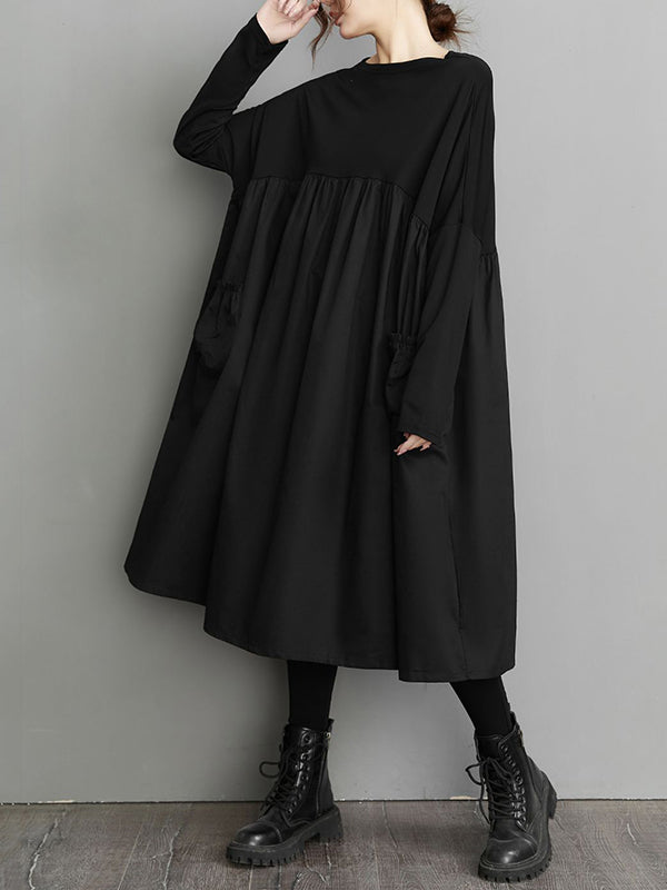 Robe mi-longue simple ample noire à empiècements, à manches longues