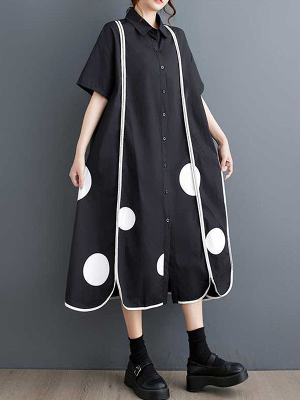 Robe chemise boutonnée fendue devant coupe trapèze, à manches mi-longues, à poches, à pois, à empiècements, à col revers