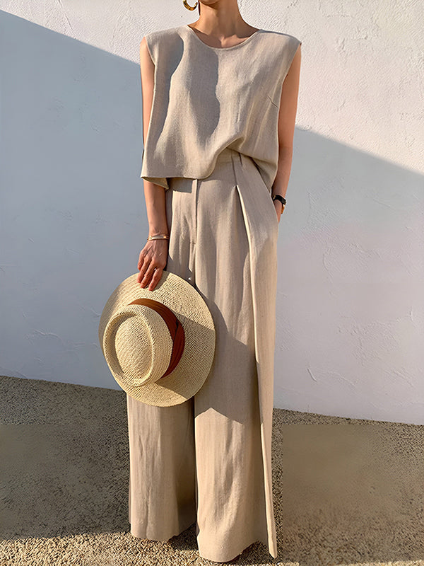 Pantalon ample plissé taille haute, à empiècements, couleur unie