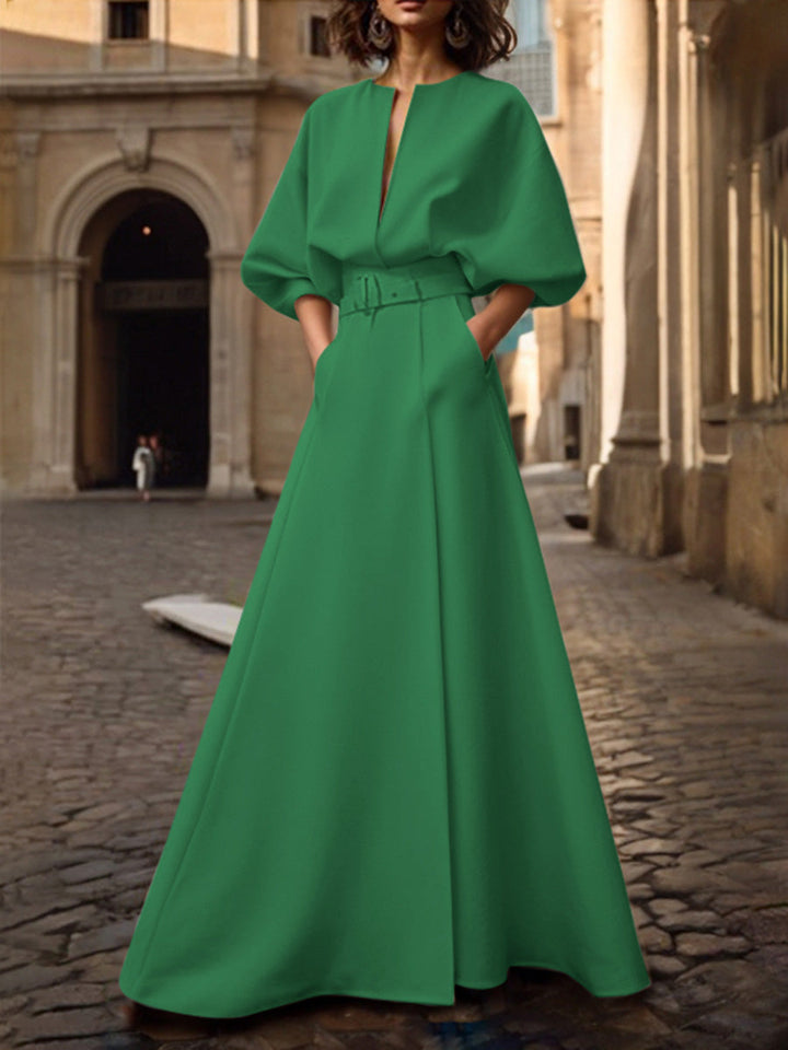 Robe longue ample à manches mi-longues, avec ceinture, à décolleté en V profond, couleur unie