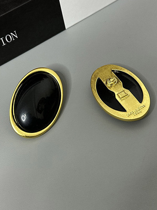 Boucles d'oreilles géométriques à empiècements