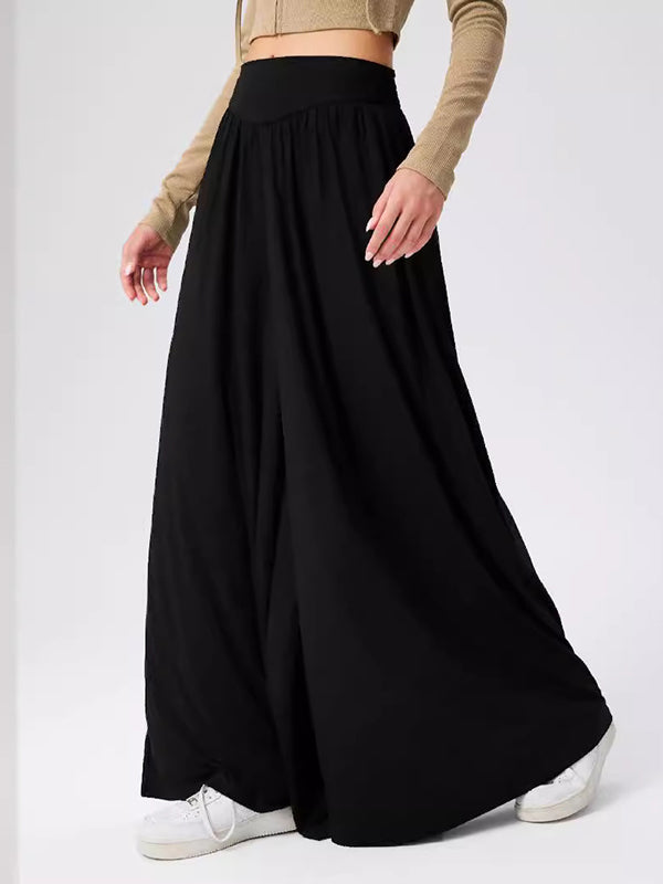 Pantalon ample plissé taille haute, à poches, à empiècements, couleur unie