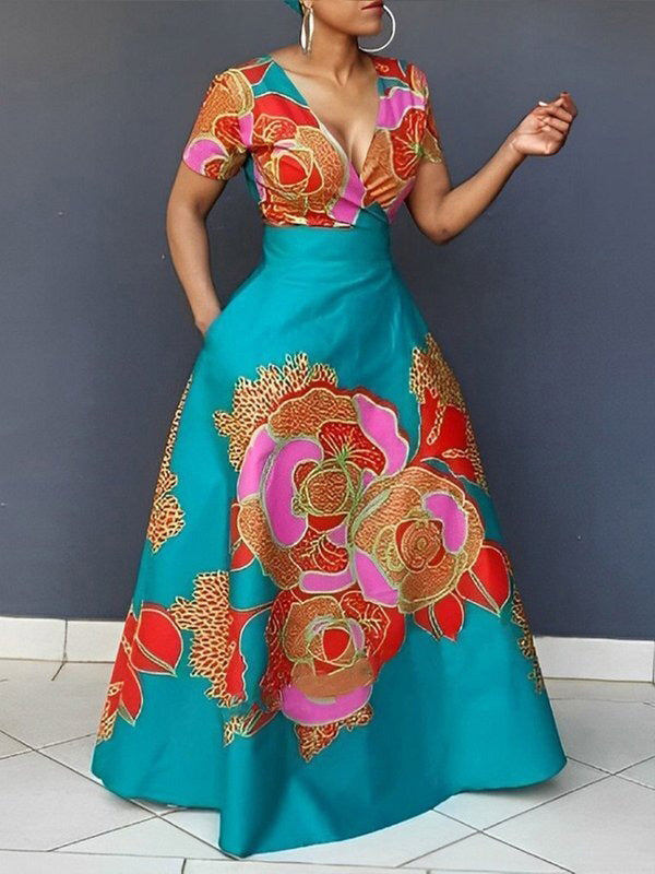 Robe de soirée longue ample coupe trapèze, à imprimé floral, à empiècements, à décolleté en V profond