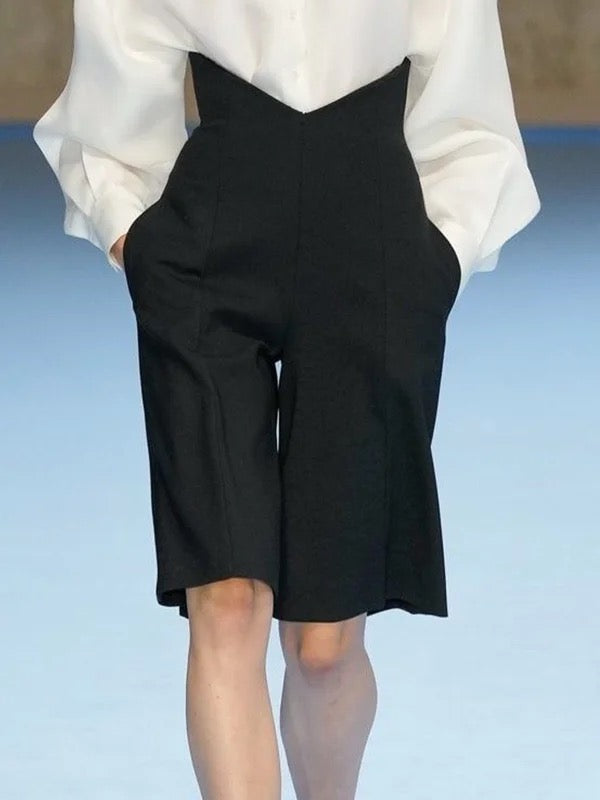 Short ample à poches, couleur unie