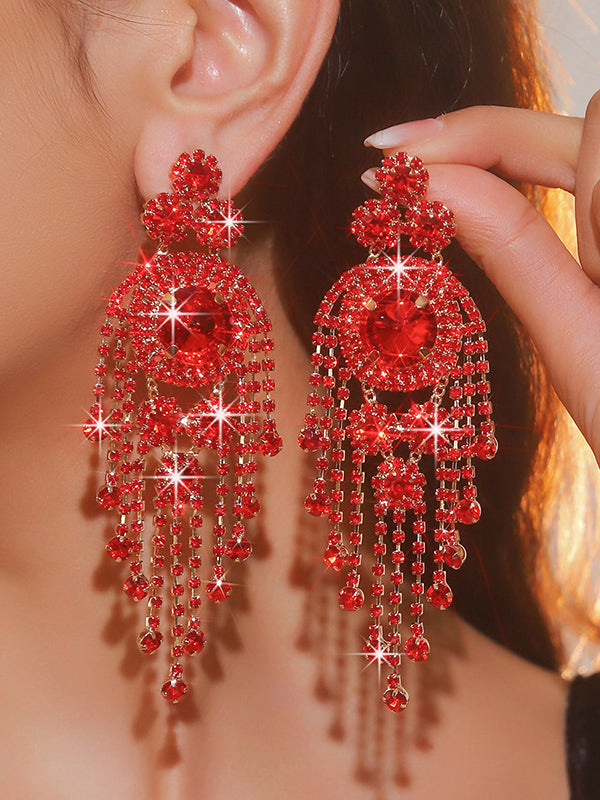 Boucles d'oreilles pendantes géométriques à pompons